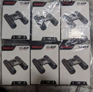 6 like new Tasco Binoculars. Price is for all.